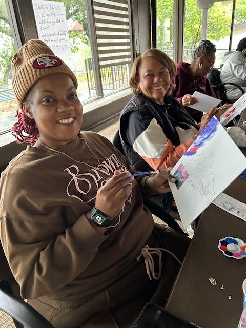 Woman painting a watercolor